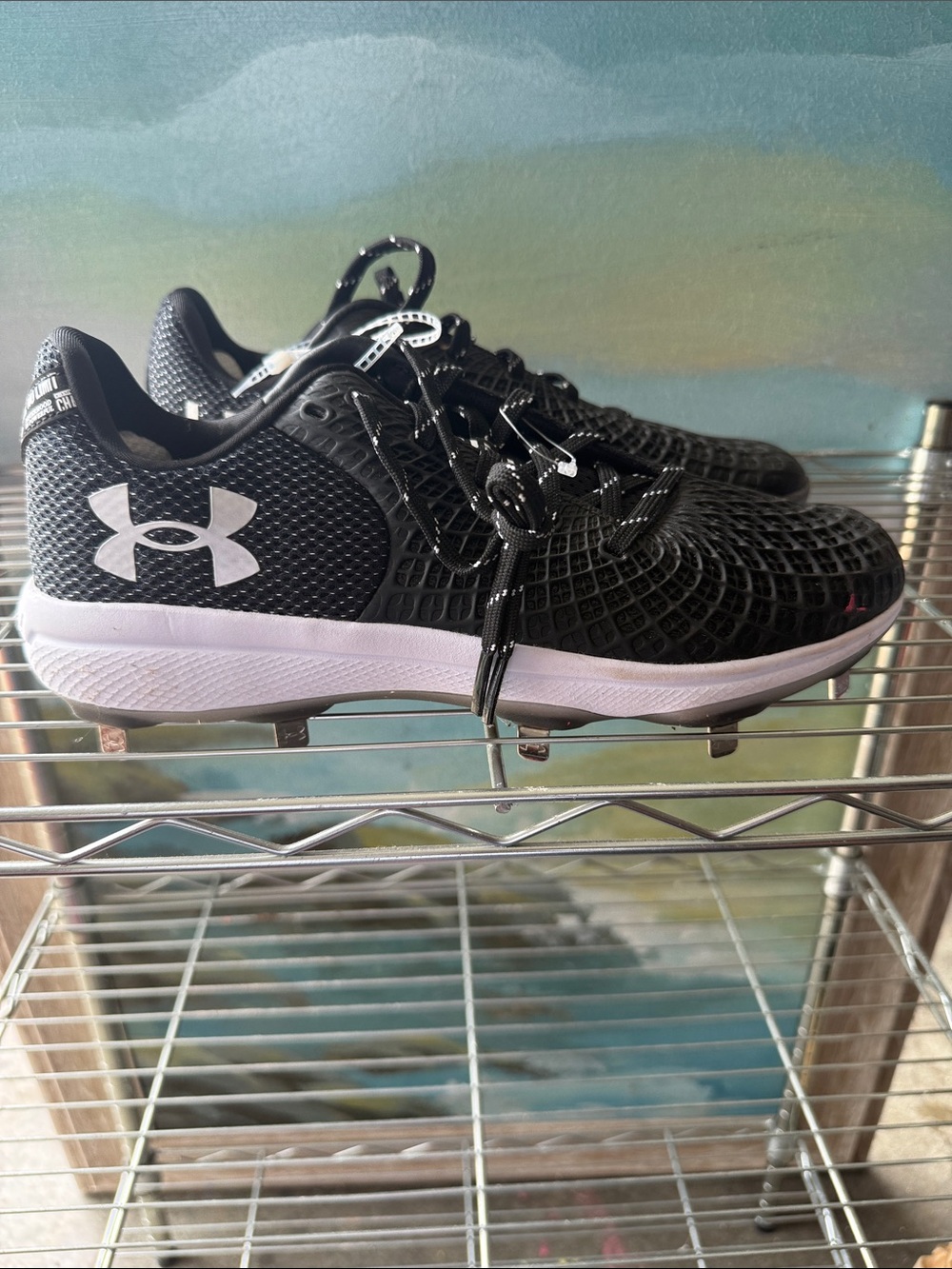 Under Armour women’s Black and White Softball Cleats